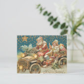 Kerstman rijdt in oldtimer auto op kerstavond briefkaart (Staand voorkant)