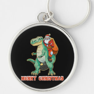 Kerstman rijdt op dinosaurus sleutelhanger