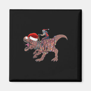Kerstman rijdt op dinosaurus T Rex Kerstmis jongen Magneet