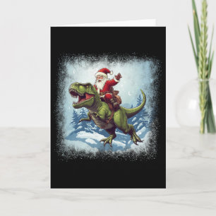 Kerstman rijdt op een dinosaurus T-rex Grappige ke Kaart