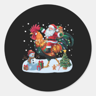 Kerstman rijdt op kip grappige kerstlichtjes kip l ronde sticker