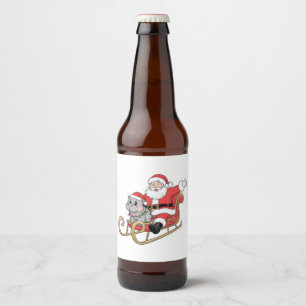 Kerstman rijdt slee met een Moo Deng baby nijlpaar Bier Etiket