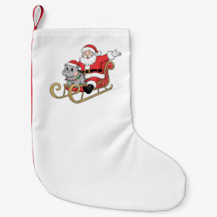 Kerstman rijdt slee met een Moo Deng baby nijlpaar Kleine Kerstsok