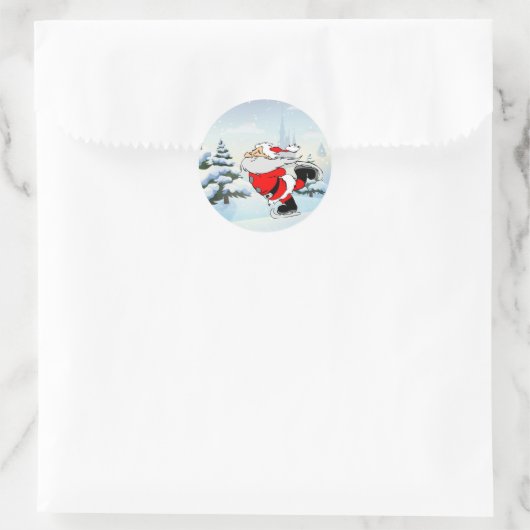 Kerstman schaatsen ronde sticker (Tas)