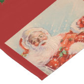 Kerstman sleept korte tafelloper (Hoek)