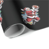 Kerstman speelt Amerikaans Football met kerst Cadeaupapier (Rol Hoek)