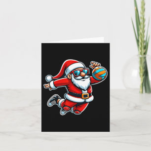 Kerstman speelt een grappige volleybal jongens kaart