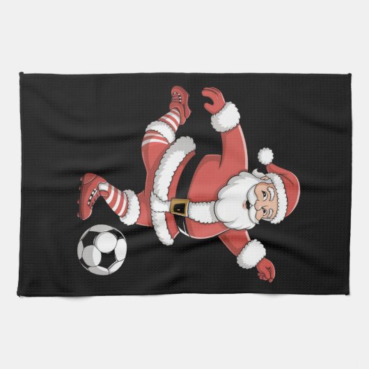 Kerstman speelt voetbal kerstsport theedoek (Horizontaal)