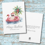 Kerstman Tropische Strand Kerstmis Feestdagenkaart<br><div class="desc">Stap in de vakantiegeest met deze unieke kerstkaart met een ontspannen kerstman in een zonnebril die loungt in een roze flamingo drijvend in de oceaan. Perfect voor het verzenden van strandvakantie wensen, deze kaart is ideaal voor iedereen die in tropische plaatsen zoals Florida, Hawaï, of de Bahama's, of voor degenen...</div>