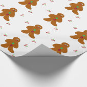 Kerstman van gemberkoek met feestelijke snoepjes cadeaupapier (Hoek)