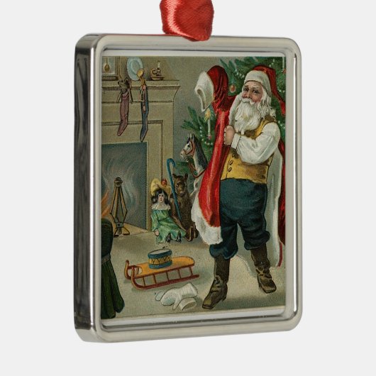 kerstman zet zijn pak aan metalen ornament (Rechts)