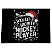 Kerstman's favoriete hockeyspeler Pyjama Kerstmis Groot Cadeauzakje (Voorkant)