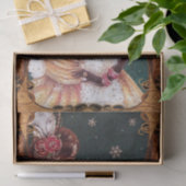 kerstmeisje in een gouden kleedtegat tissuepapier (Geschenk)