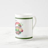 Kerstmeisje met koekje porselein kop (Voorkant rechts)