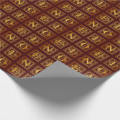 Kerstmetallisch goud op donkerrood cadeaupapier (Hoek)