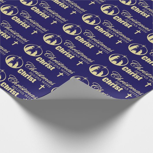 Kerstmis begint met Christus op blauw Cadeaupapier (Hoek)