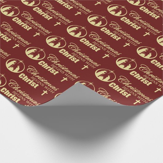 Kerstmis begint met Christus op rood Cadeaupapier (Hoek)