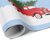 Kerstmis dennenboom en vrachtwagen auto op de snee cadeaupapier (Rol Hoek)