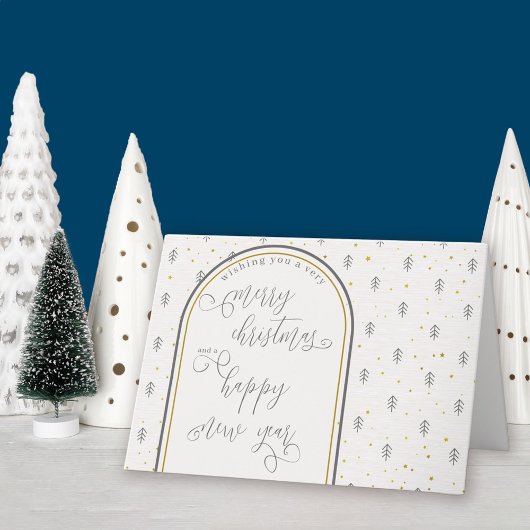 Kerstmis en nieuwjaarskalligrafie en noordse pine feestdagen kaart