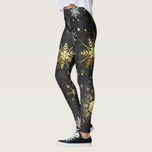 Kerstmis Gouden Sneeuwvlokken op Zwarte Achtergron Leggings (Links)