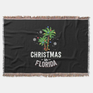 Kerstmis in Florida decimeert de palmboomfamilie v Deken