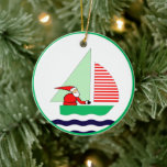 Kerstmis Keramisch Ornament<br><div class="desc">Zeilkerstcadeau met kerstman in een zeilboot. Om tekst te personaliseren en te bewerken om een naam toe te voegen.</div>