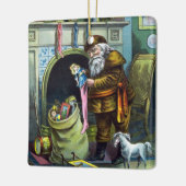 Kerstmis, kerstkerstmannetjes met speelgoed keramisch ornament (Links)