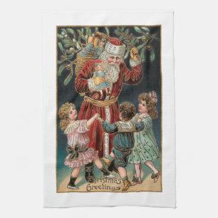 Kerstmis met dansende kinderen en mistletoe theedoek
