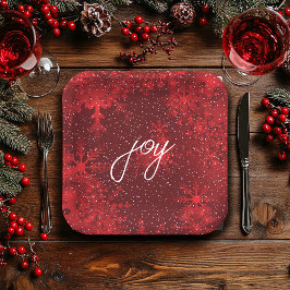 Kerstmis met de rode sneeuwvlokken die sneeuw vall papieren bordje