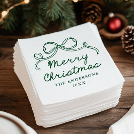 Kerstmis met een groene strik in fantasievolle han servet