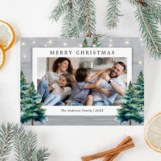 Kerstmis met familiefoto bij rustige dennenboom feestdagenkaart