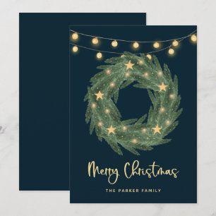 Kerstmis met gouden strijklampjes op blauw feestdagenkaart
