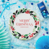 Kerstmis met groene bladeren en rode bessen papieren bordje (Feest)