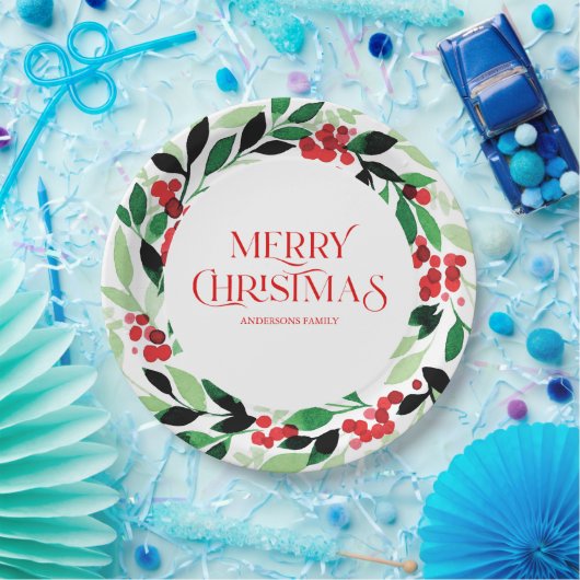 Kerstmis met groene bladeren en rode bessen papieren bordje (Feest)