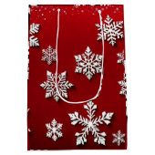 Kerstmis met rode en witte sneeuwvlokken medium cadeauzakje (Achterkant)