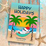 Kerstmis met Tropisch strand Santa Hammock Feestdagenkaart<br><div class="desc">De kerstkaart voor tropisch en kustthema heeft de kerstman in een hammock op het strand, die geniet van de golven van de oceaan en van een kleurrijke zonsondergang en feestelijke palmbomen die in het licht van de snaren zijn verscheurd. De hoogste groet zegt "Prettige feestdagen" in blauw van de marine....</div>