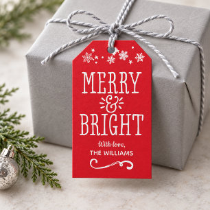Kerstmis met vrolijke en heldere rode sneeuwvlokke cadeaulabel