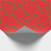 Kerstmis op rood cadeaupapier (Hoek)