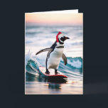 Kerstmis pinguïn surfen op een golf feestdagen kaart<br><div class="desc">Schattigee pinguïn surfen op een surfplank met een Sinterklaas pet. Alle tekst kan worden bewerkt.</div>