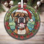 Kerstmis Poinsettia Santa Hoed Boxer Hond Glas Ornament<br><div class="desc">Hier is een glazen ornament met een gebrandschilderd glasthema, met een bruine en witte Boxerhond. De hond draagt een rode kerstmuts en kraag, met een blauwe groene berg- en hemelachtergrond. Het afbeelding is omlijst in een groene hulst, rode bes, en poinsettia rand. Dit maakt een mooie kousenvulling of decoratie voor...</div>