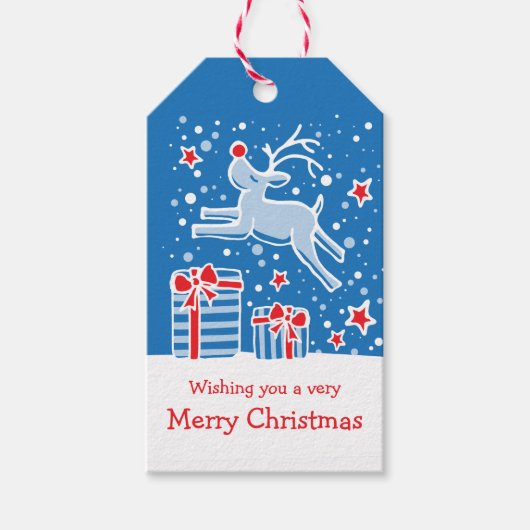 Kerstmis rendieren springen over geschenken blauw cadeaulabel (Voorkant)