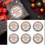 Kerstmis Ronde Sticker<br><div class="desc">Een vintage kerstkrans cadeau sticker. Vergeet niet om de namen te veranderen! Voeg uw aangepaste formulering toe aan dit ontwerp door gebruik te maken van de "Edit this design sjabloon"-vakken aan de rechterkant van het item, of klik op de knop "Customize It" om de tekst te rangschikken, de lettertypen en...</div>