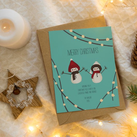 Kerstmis Sneeuwmannenduo – Winterlichten op Teal Briefkaart