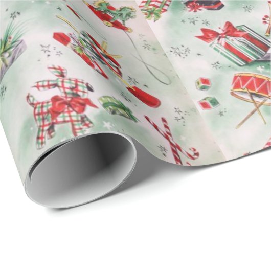 Kerstmis,  speelgoed, stokken, snoepriet cadeaupapier (Rol Hoek)