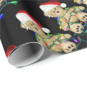 Kerstmis teddybeer verstrikt in lichten cadeaupapier (Rol Hoek)