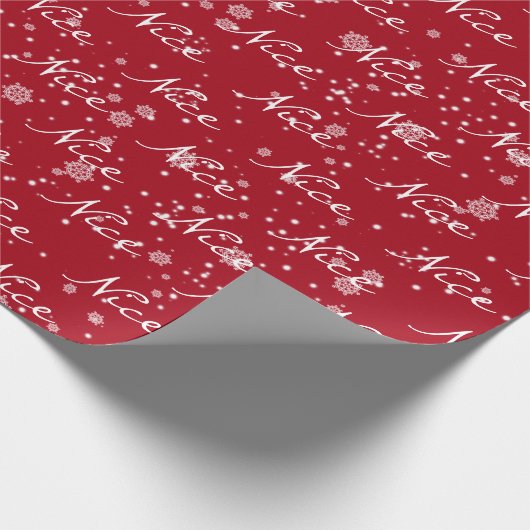 Kerstmis, tekst in sneeuwvlokken cadeaupapier (Hoek)