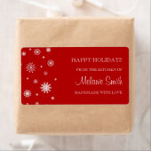 Kerstmis uit de keuken van de rode sneeuw op de et etiket (Insitu)