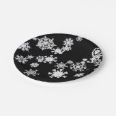 Kerstmis witte sneeuwvlokken op zwart papieren bordje (Gekanteld)