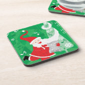 Kerstmis, zingende en dansende kerstman bier onderzetter (Linkerzijde)