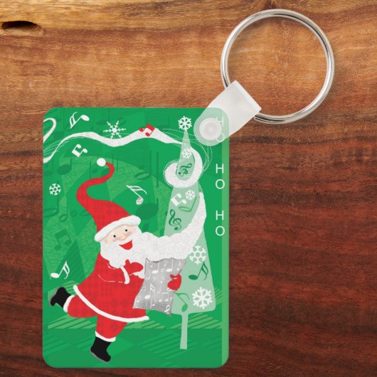 Kerstmis, zingende en dansende kerstman sleutelhanger (Achterkant)